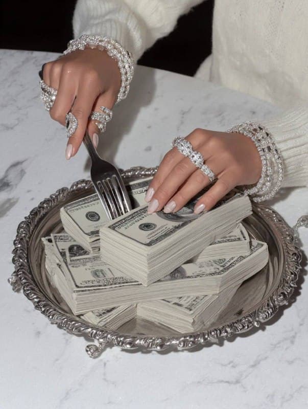 editorial shot of hands with lots of rings holding knife and fork near stainless…؛ عکس ساخته‌شده با هوش مصنوعی و پرامپت فارسی در Axeto