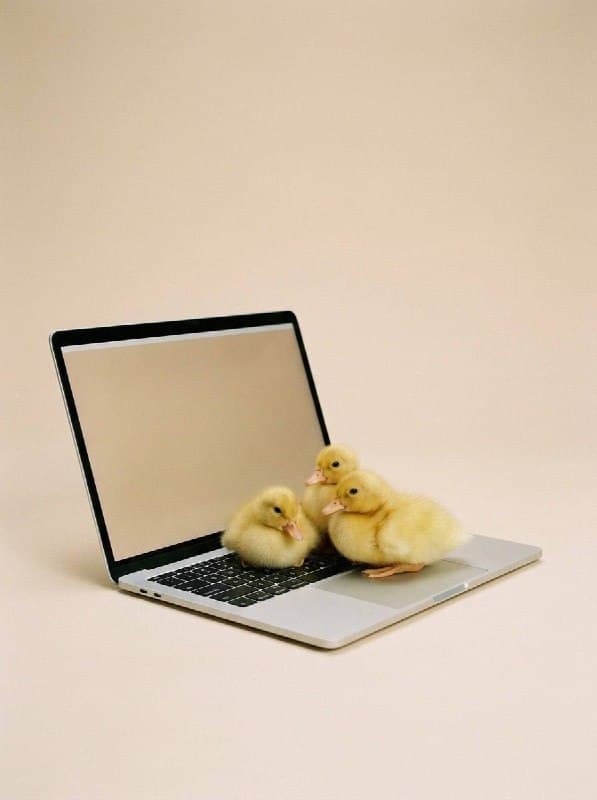 Three tiny fluffy yellow ducklings sitting on top of [OBJECT]. Soft beige backgr…؛ عکس ساخته‌شده با هوش مصنوعی و پرامپت فارسی در Axeto